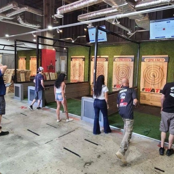 a group of people standing in front of a building