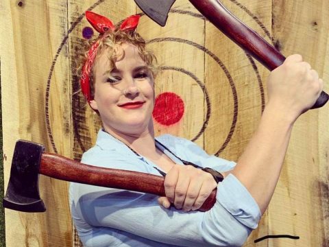 a person holding a baseball bat