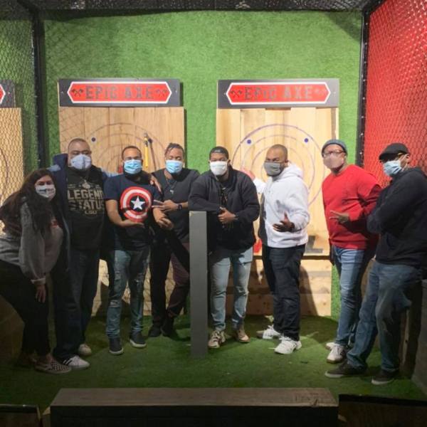 a group of people standing in front of a building