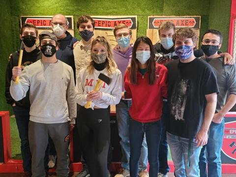 a group of people posing for a photo