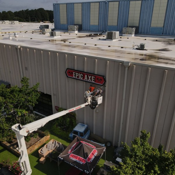 a close up of a fence in front of a building