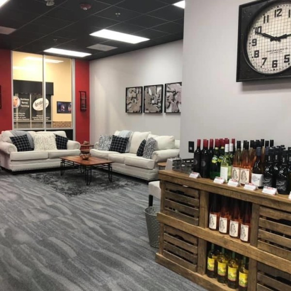 a room filled with furniture and a clock