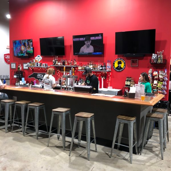 a room with a table and a television