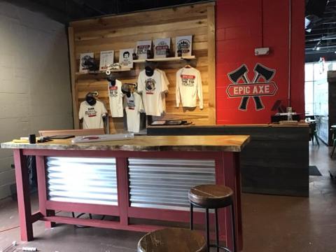 a person sitting at a desk in a room