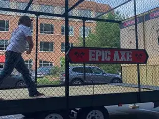 a person riding on the back of a truck